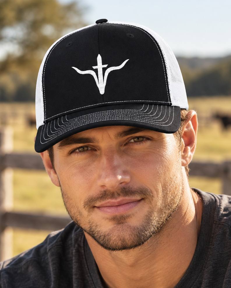LFD Signature Trucker Hat — Black / White, worn outdoors, close view