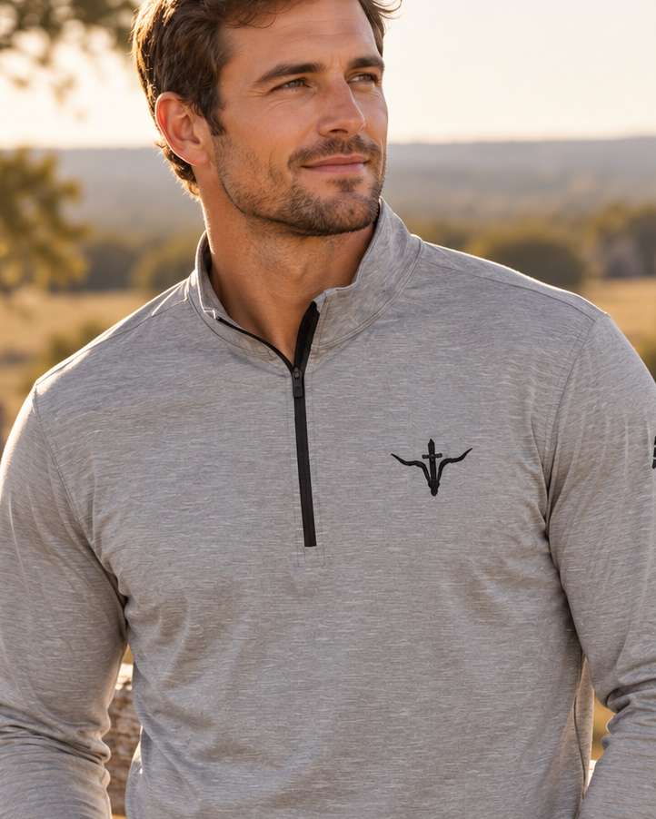 LFD adidas Quarter-Zip — Black Heather, worn outdoors, chest embroidery detail