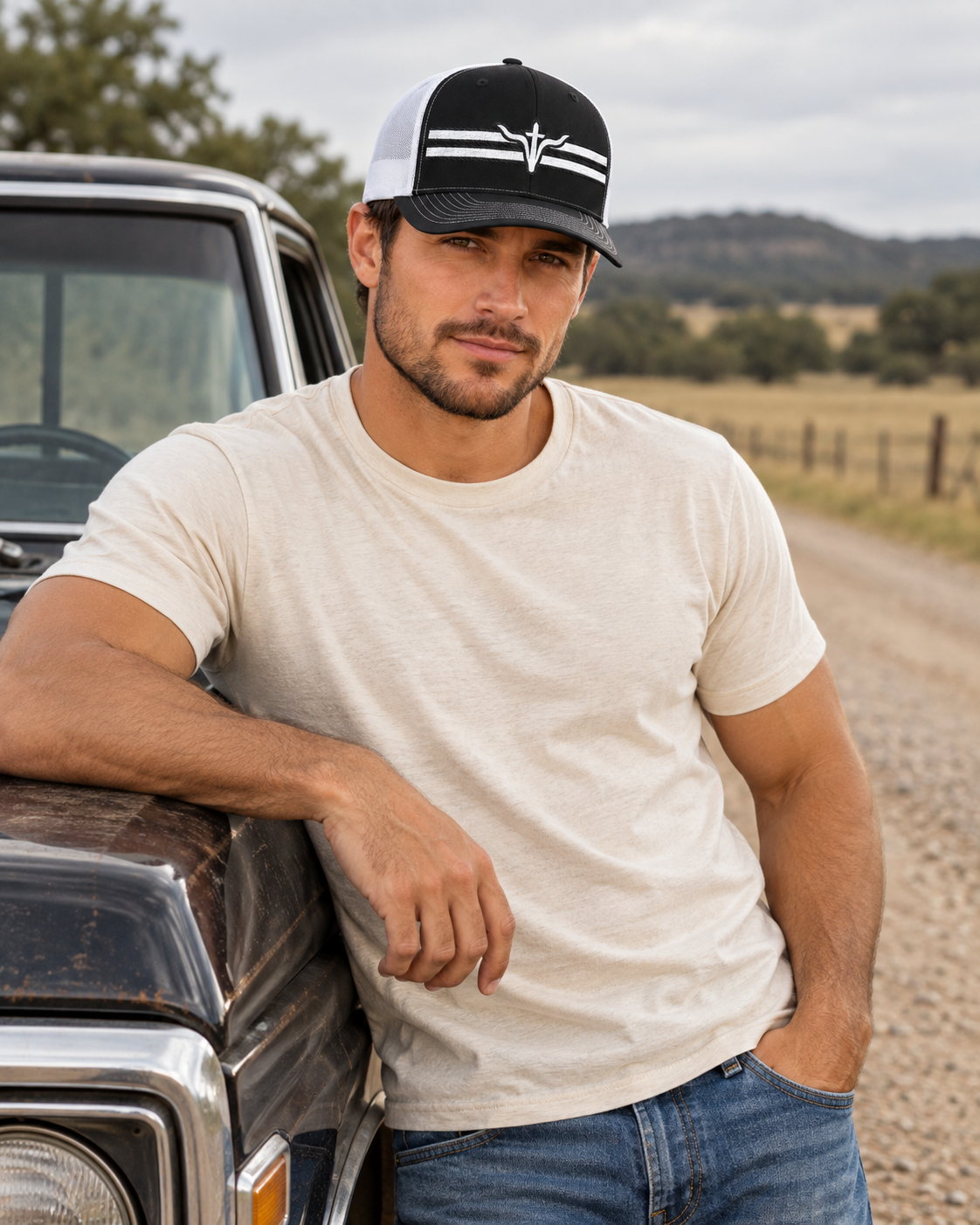 LFD Stripes Trucker Hat — Black / White, worn beside a truck
