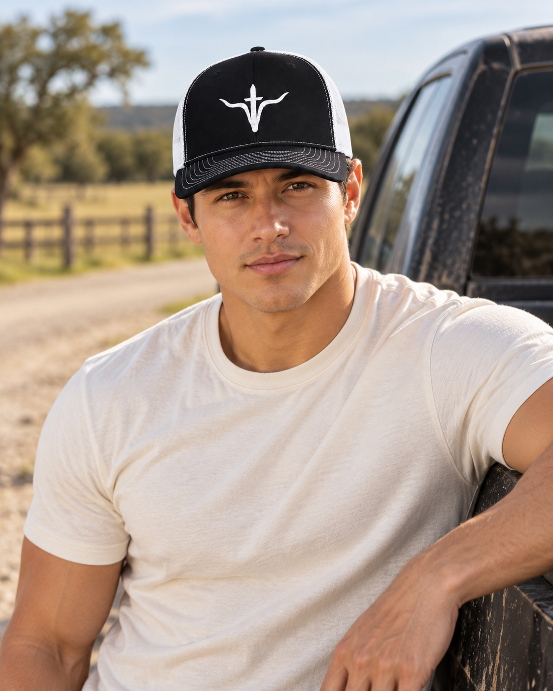LFD Signature Trucker Hat — Black / White, worn beside a truck
